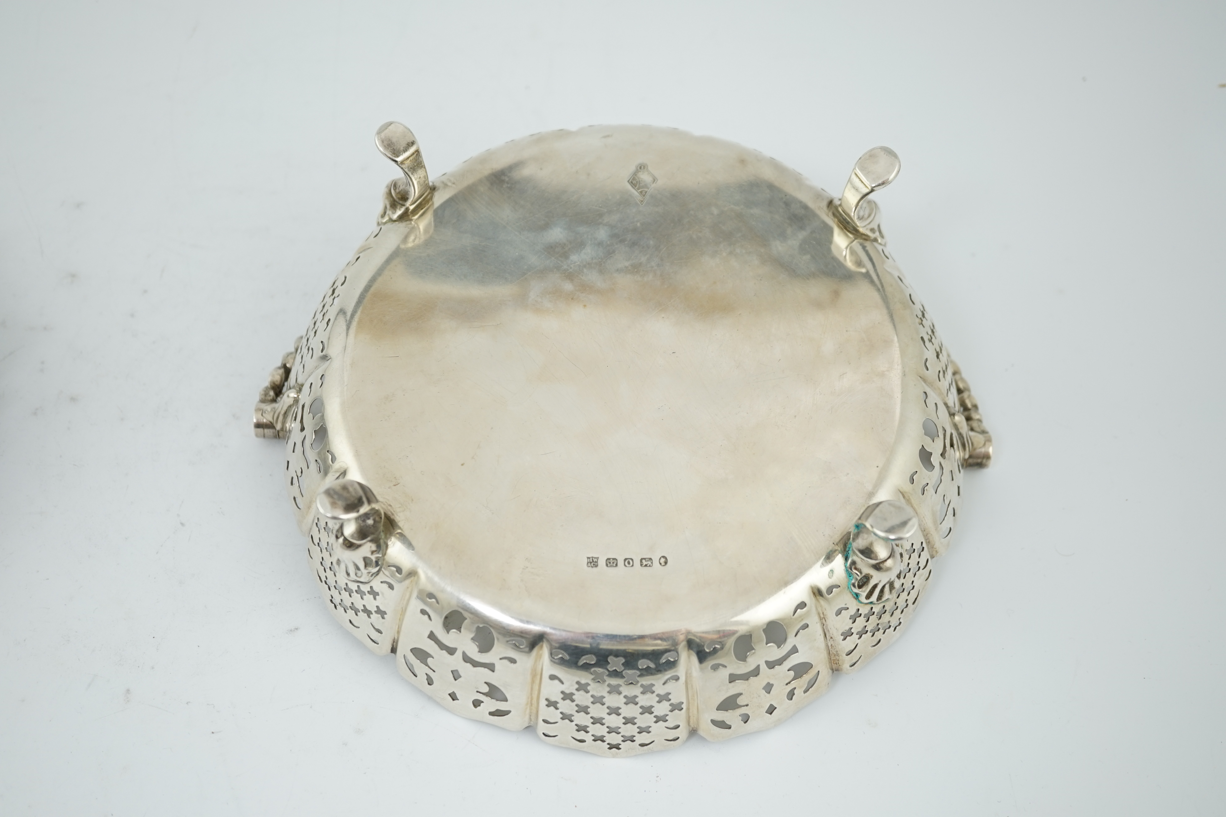 A Victorian pierced silver shallow circular cake basket, by Henry Wilkinson & Co